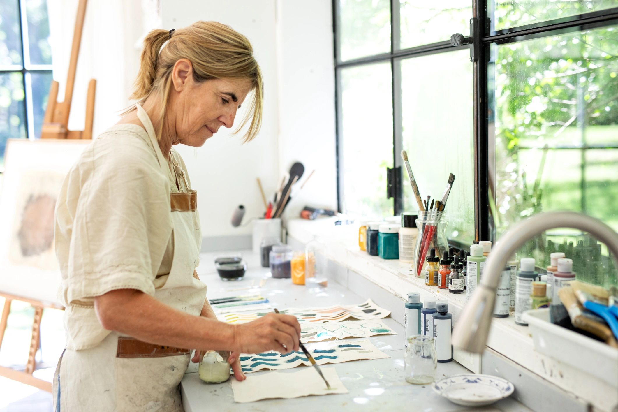 Artist in studio (customer avatar placeholder)